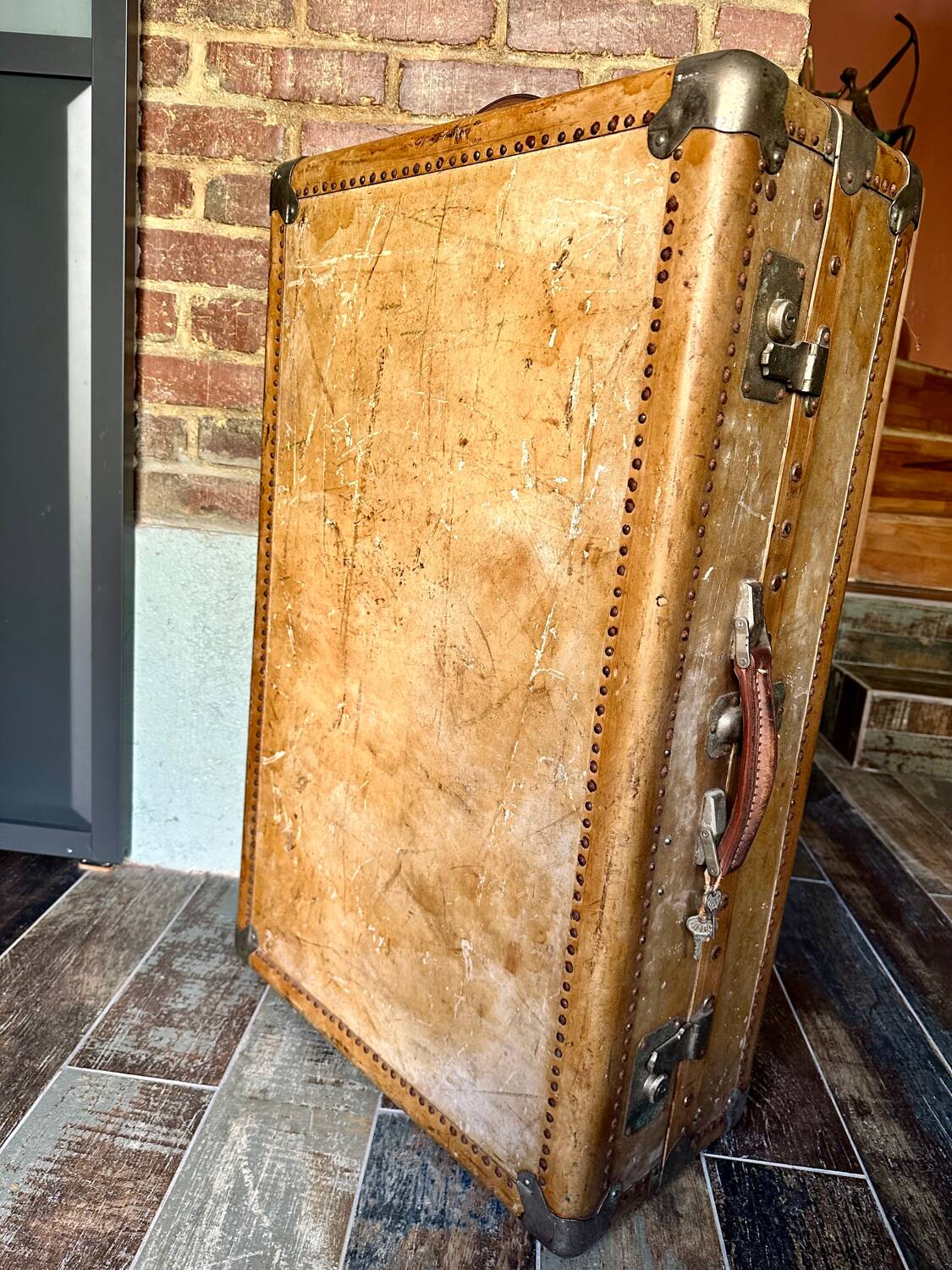 Antique cabin trunk in vellum