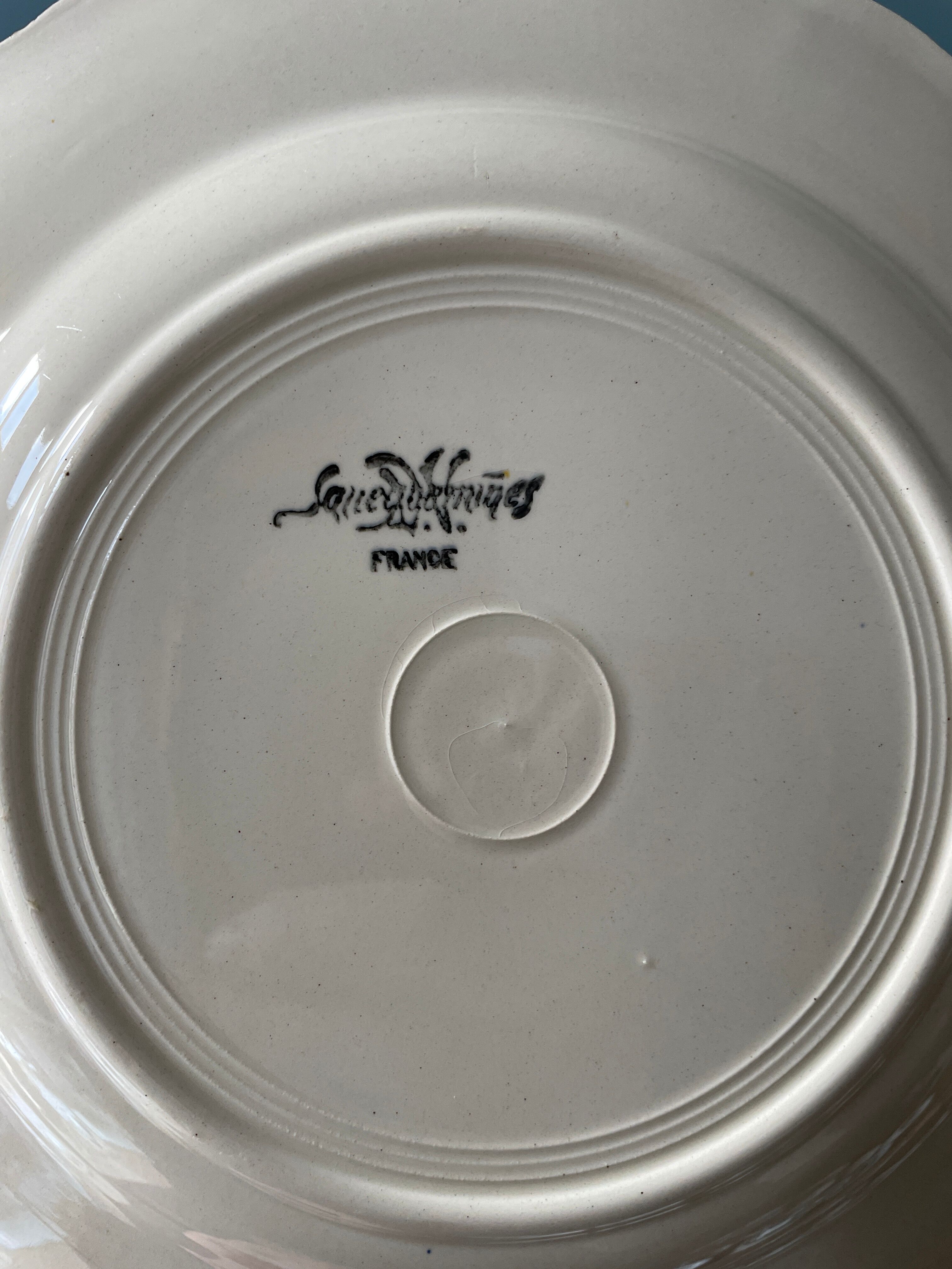 Set of 11 flat earthenware plates from Sarreguemines France