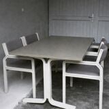 Dining table set and 4 dining chairs by Pierre Mennen for Pastoe.