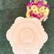 Art Deco lamp from the 1930s with an opaline globe featuring a pink flower.