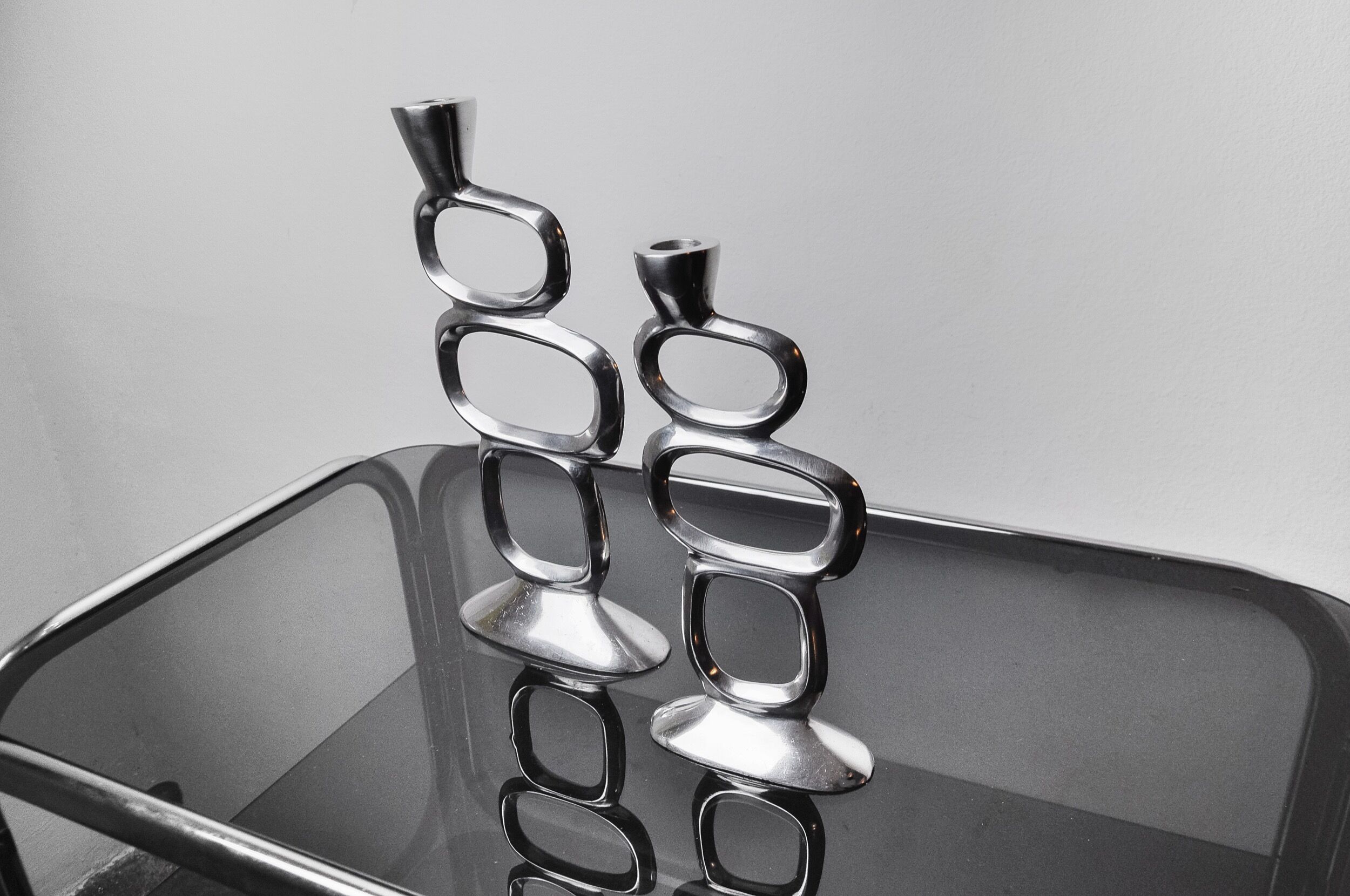 Pair of circle candlesticks by Matthew Hilton, England, 1980