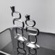 Pair of circle candlesticks by Matthew Hilton, England, 1980