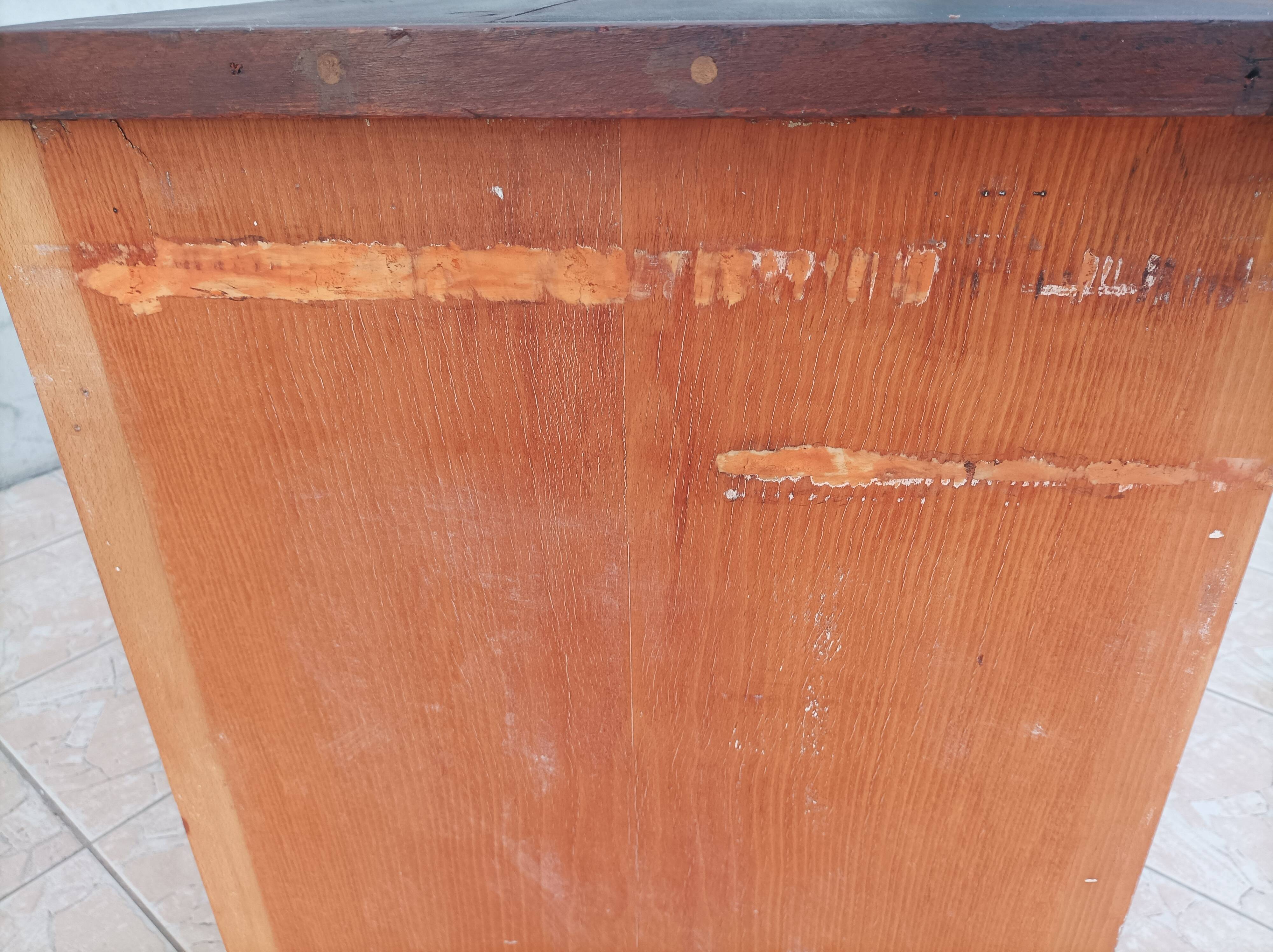 Workshop furniture with drawers and curtain in beech and walnut.