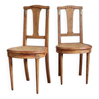 Lot de deux jolies chaises cannées de style Louis XVI