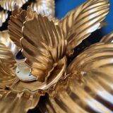 Pair of Masca flower wall lights in gold metal