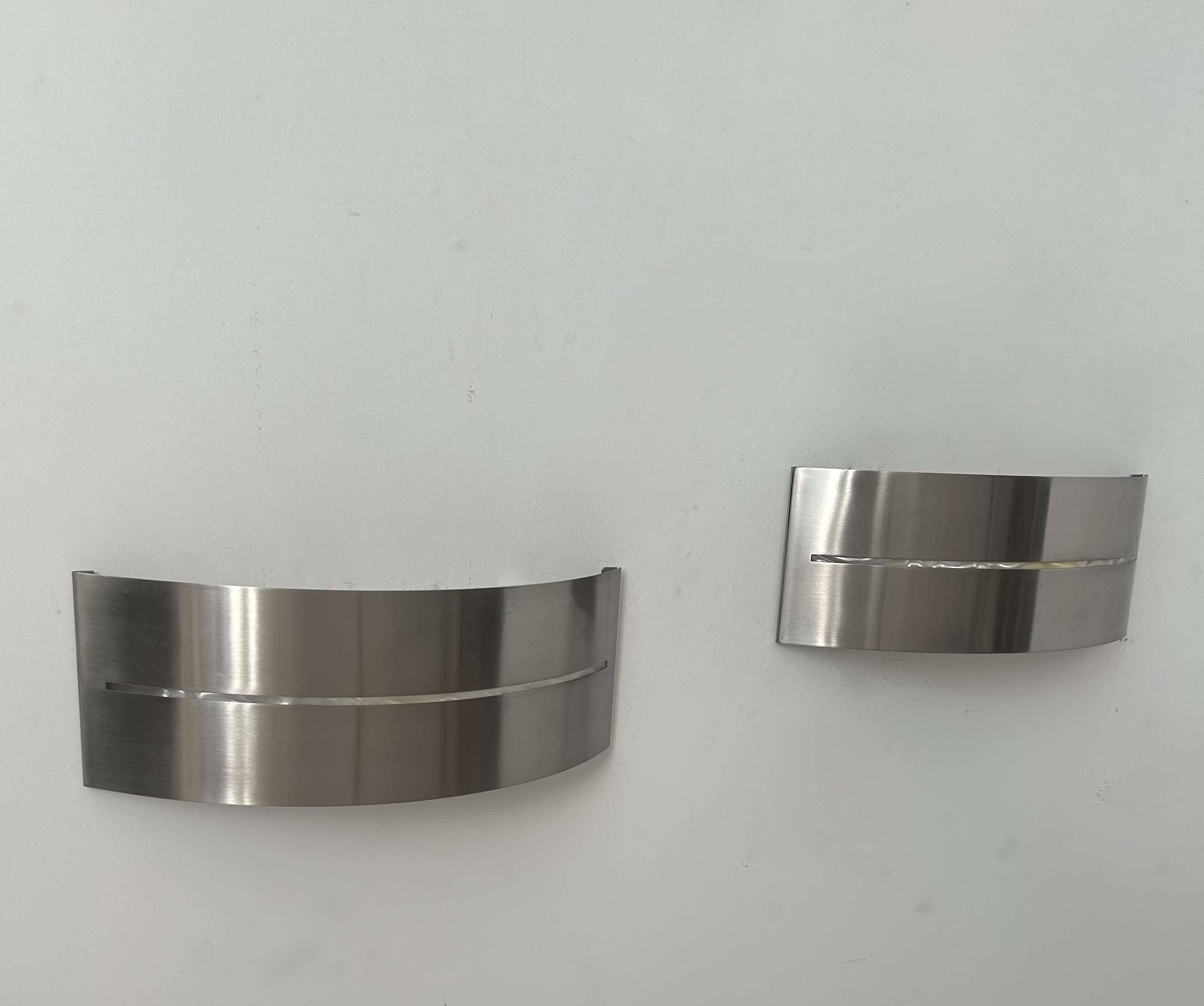 Pair of vintage wall lights, brushed metal, France 1980.