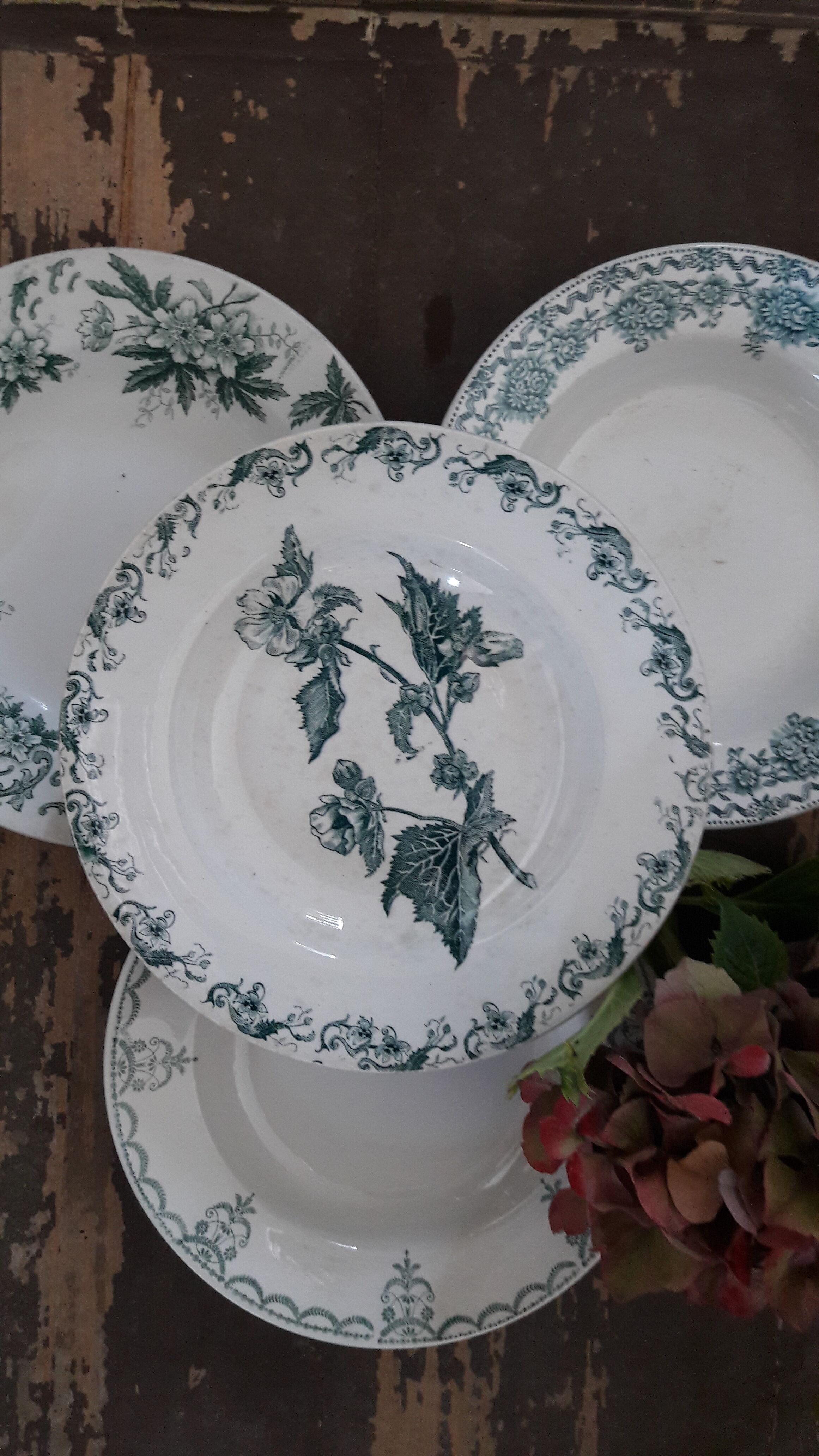Lot of four mismatched hollow plates
