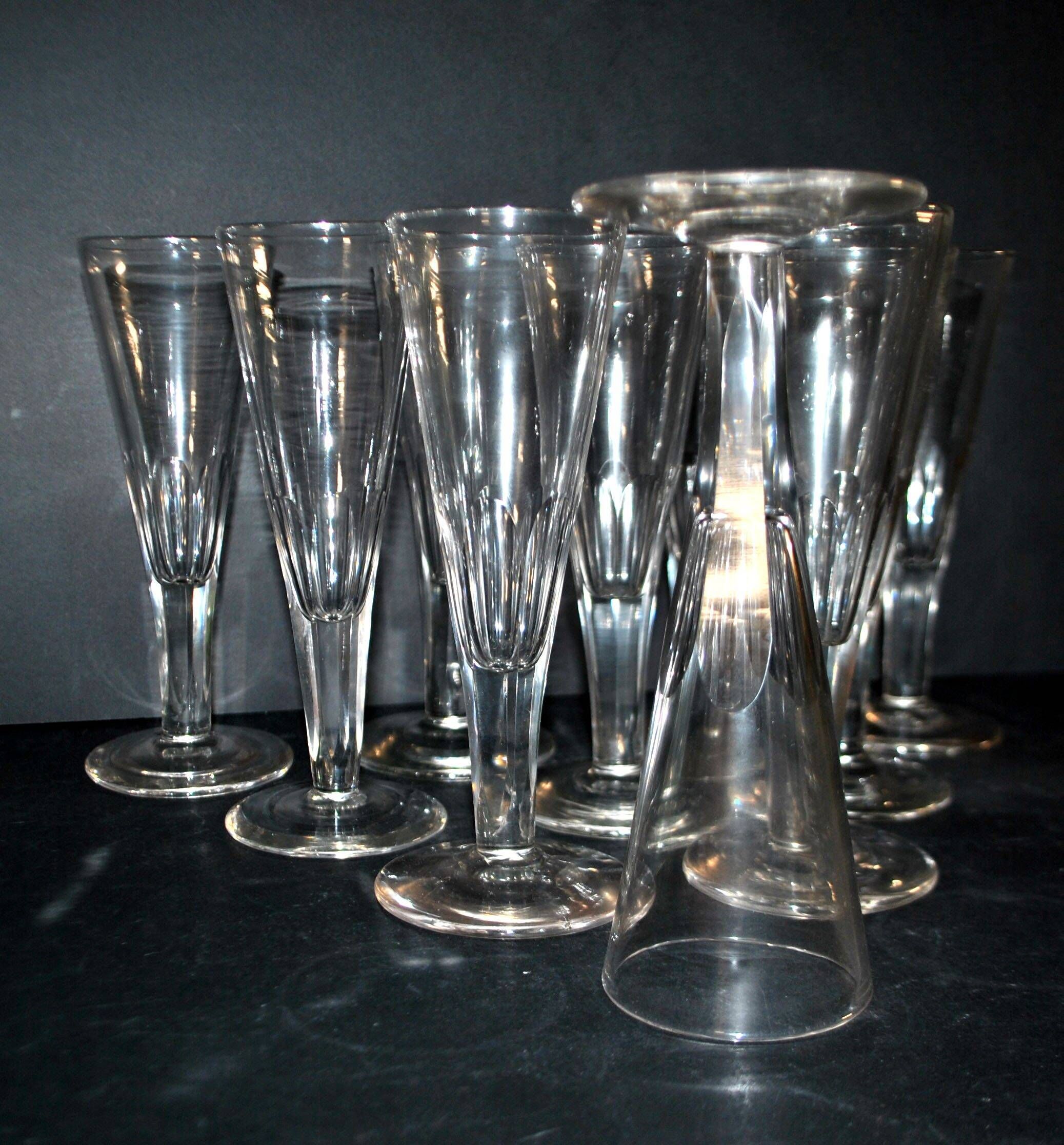 Portieux? Meisenthal? Set of 10 cut glass champagne flutes with flat sides from 1900.