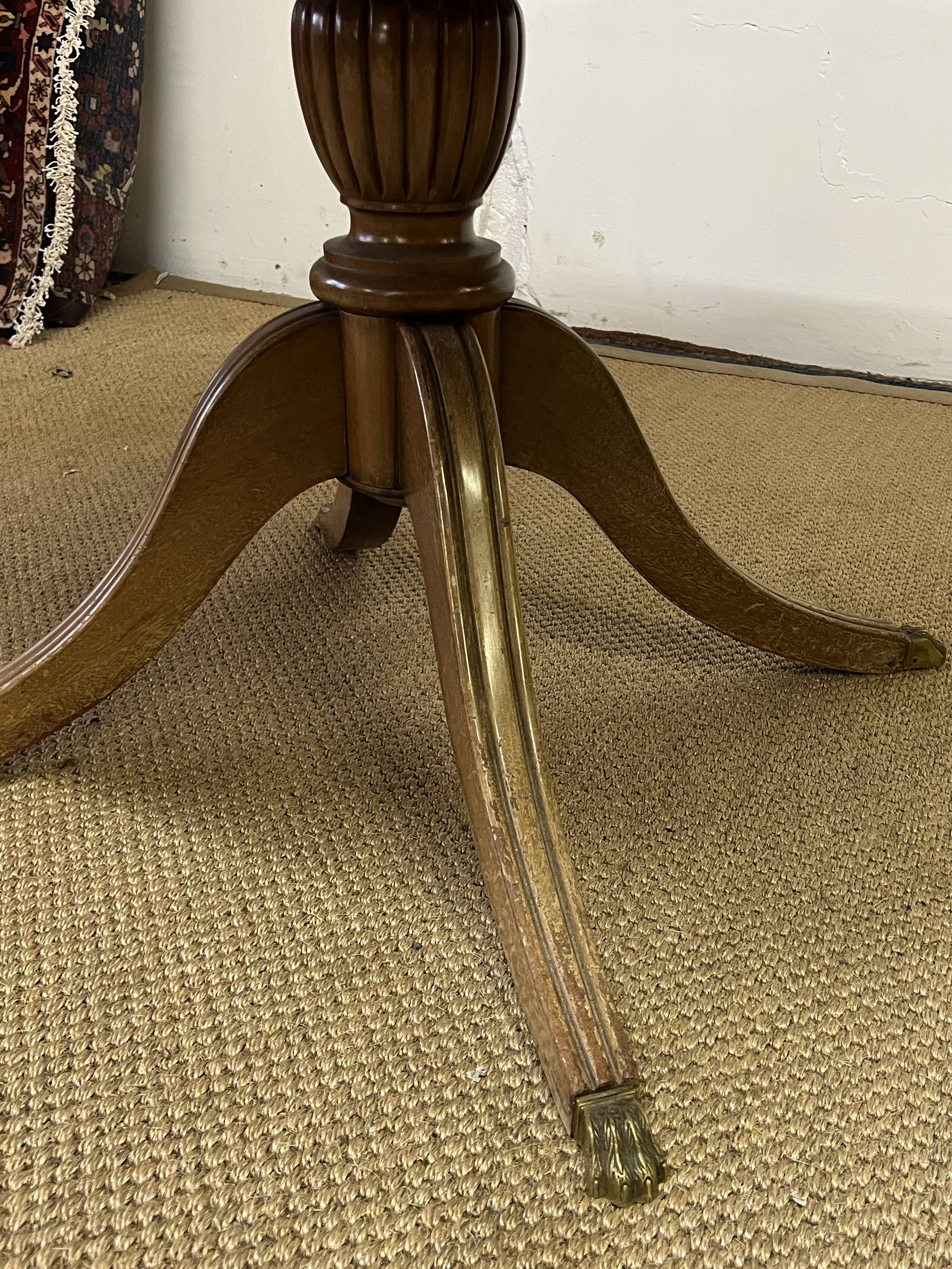 Empire style round table "Lion's Paws"