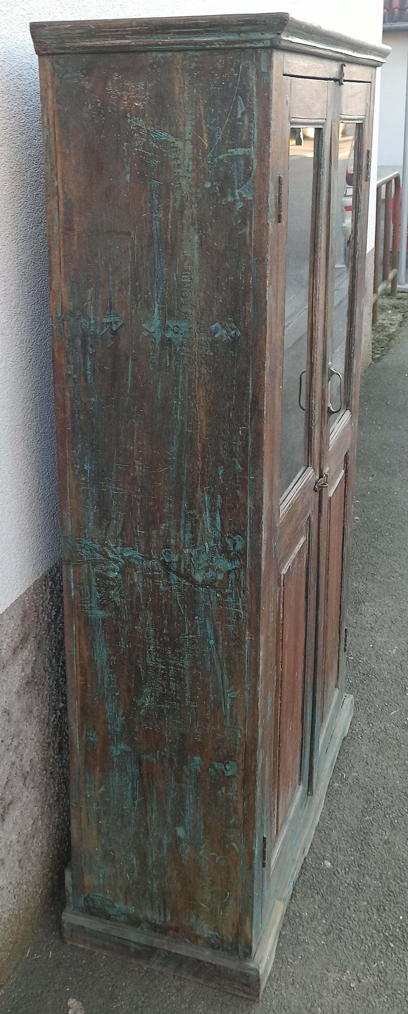 Old glazed wooden cabinet with beautiful patina