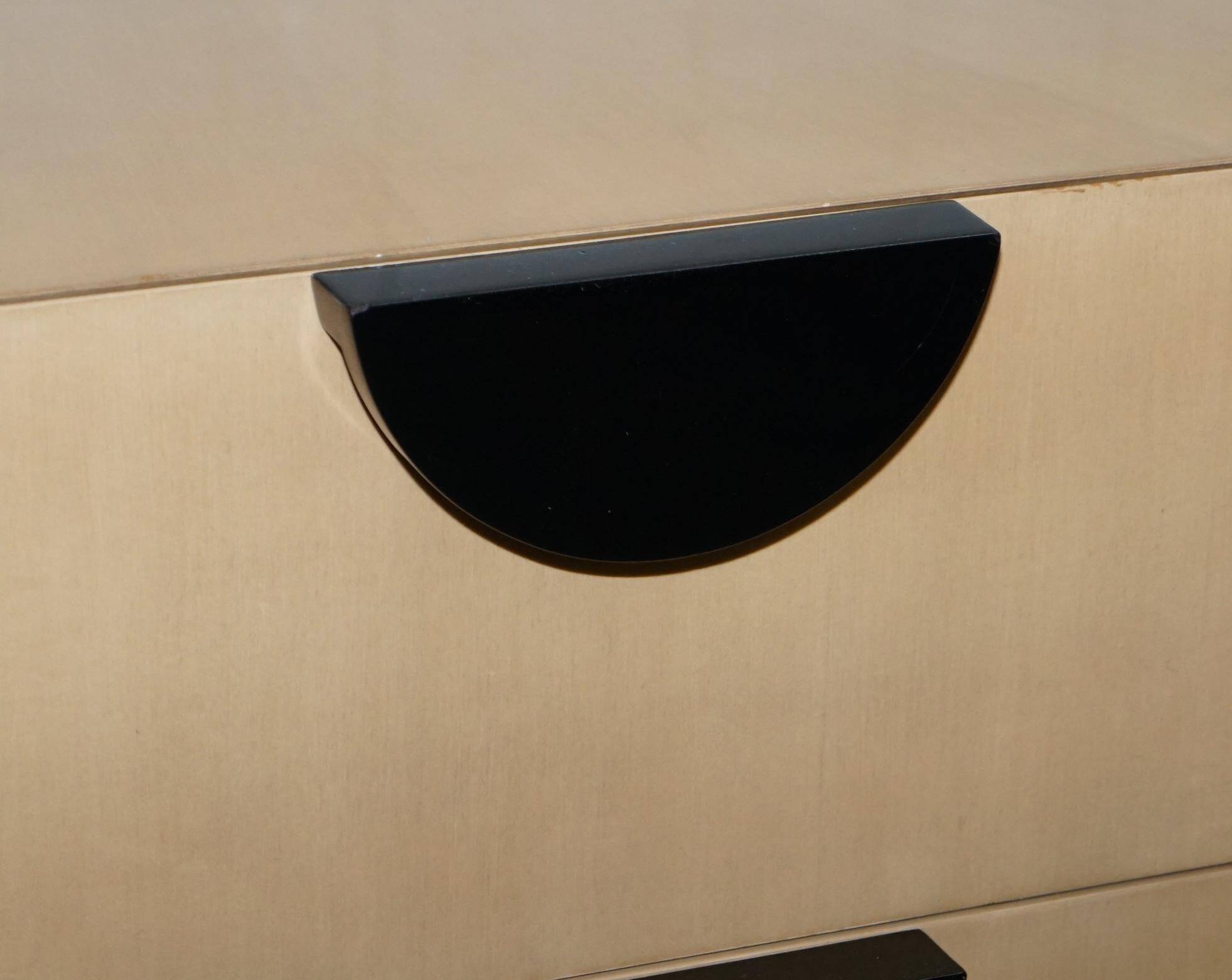 Cloud bedside tables by J Robert Scott with 14-carat gold veneer.