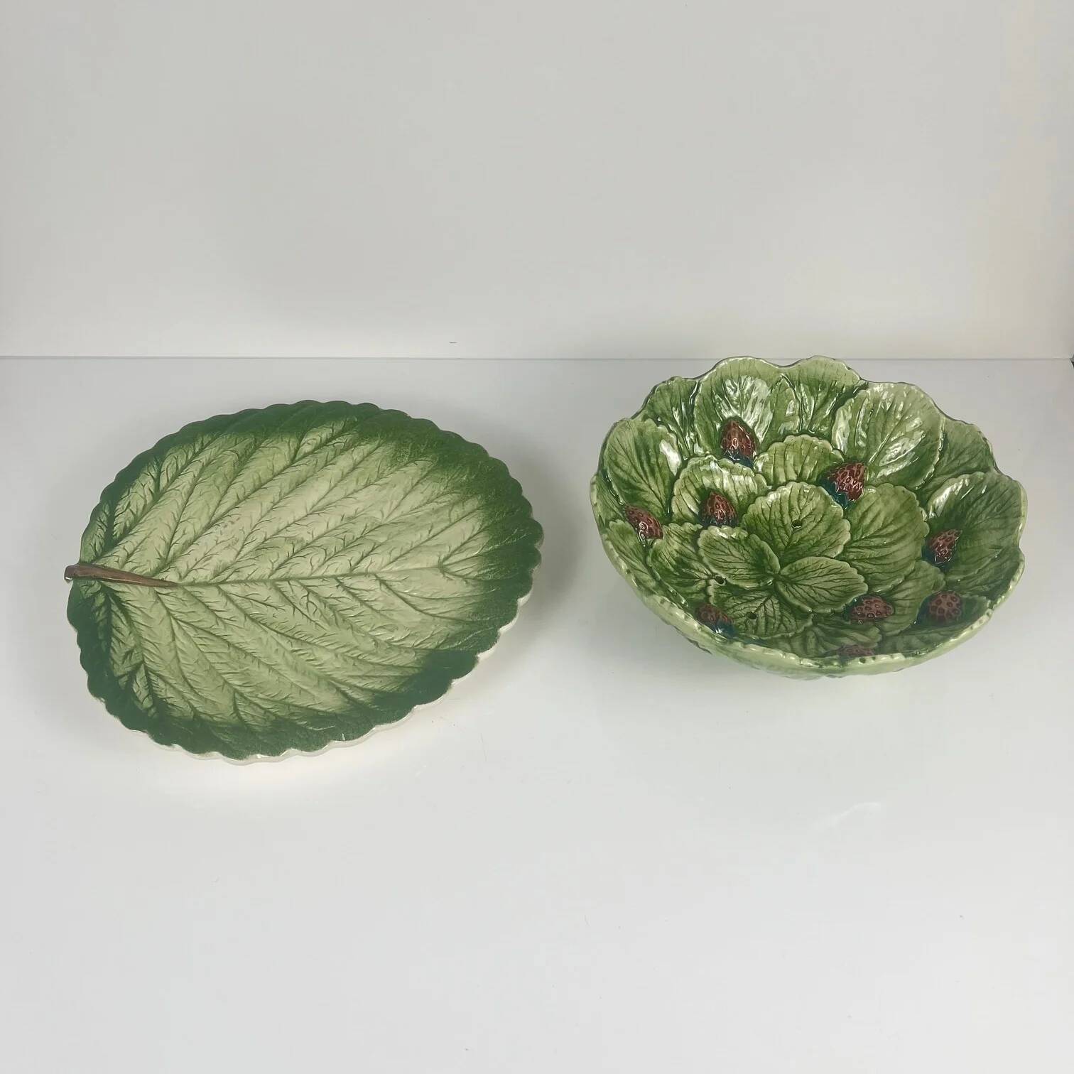 Leaf and strawberry-shaped bowl/strainer.