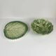 Leaf and strawberry-shaped bowl/strainer.