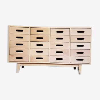 Merchandising chest of drawers by James Leonard Esavian