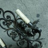 Two large wrought iron wall lights