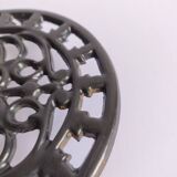 Large vintage black cast iron trivet