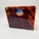 Lucite magazine rack "tortoiseshell", 1970s