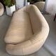 Rounded off-white leather sofa