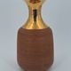 Vase in raw chamotte sandstone enameled with gold, Italy, Bitossi for Raymor, circa 1960/1970