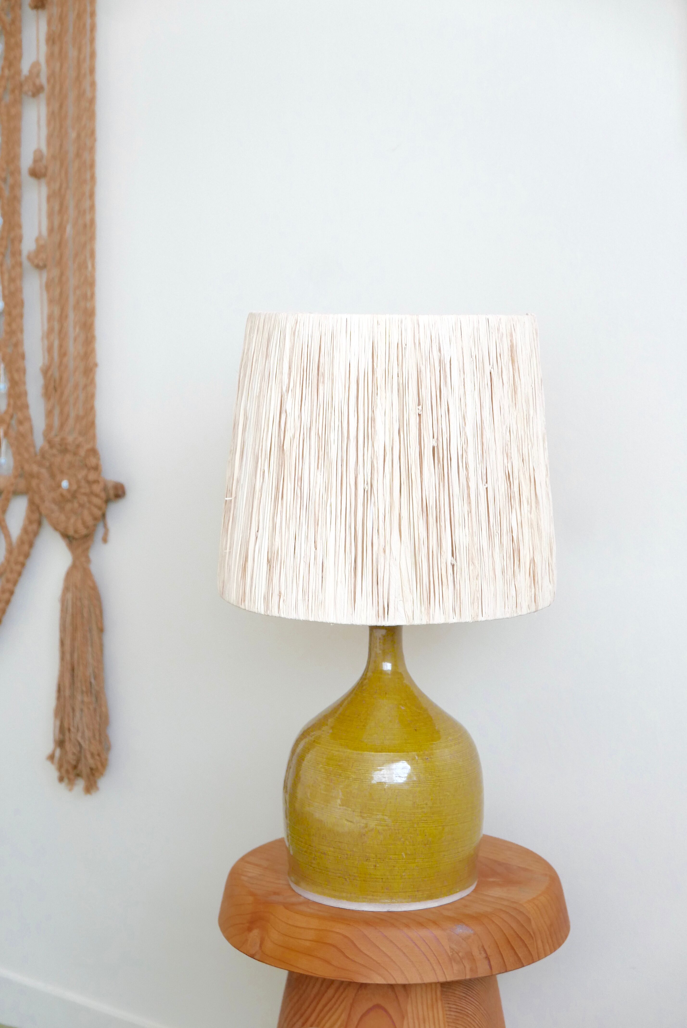 Aniseed green ceramic pottery lamp, raffia lampshade, 70s