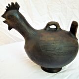 Pourer, terracotta teapot. Hen.