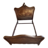 Very beautiful antique double bed in Louis XV style, made of wood and walnut veneer.