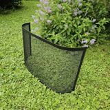 Curved chimney fire screen