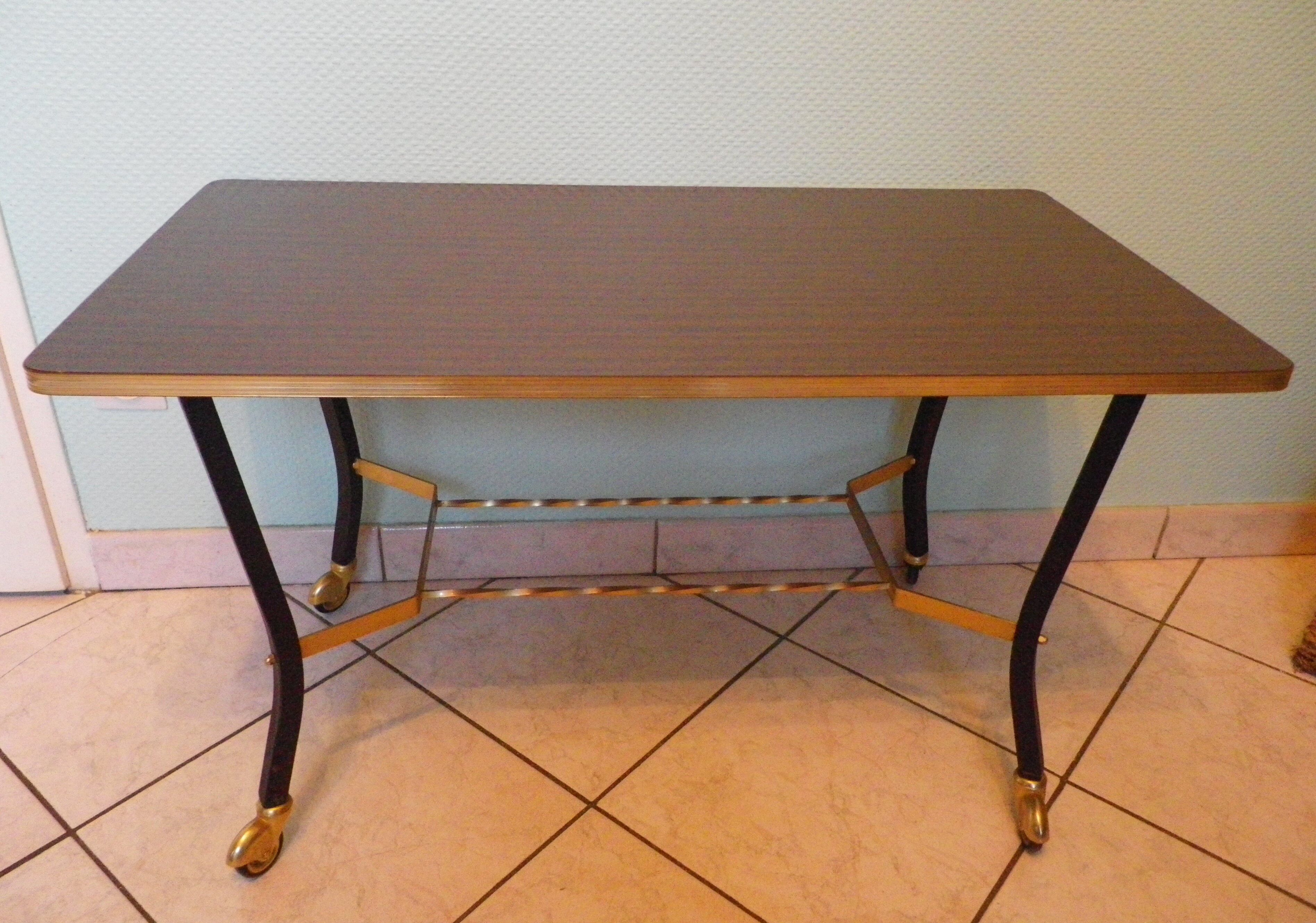 Lounge table, side table on wheels, formica top, gold and black metal