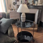 Vintage side table on wheels – black glass top