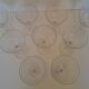 9 crystal water glasses from Baccarat Magenta Grain De Riz, height 15.5 cm.