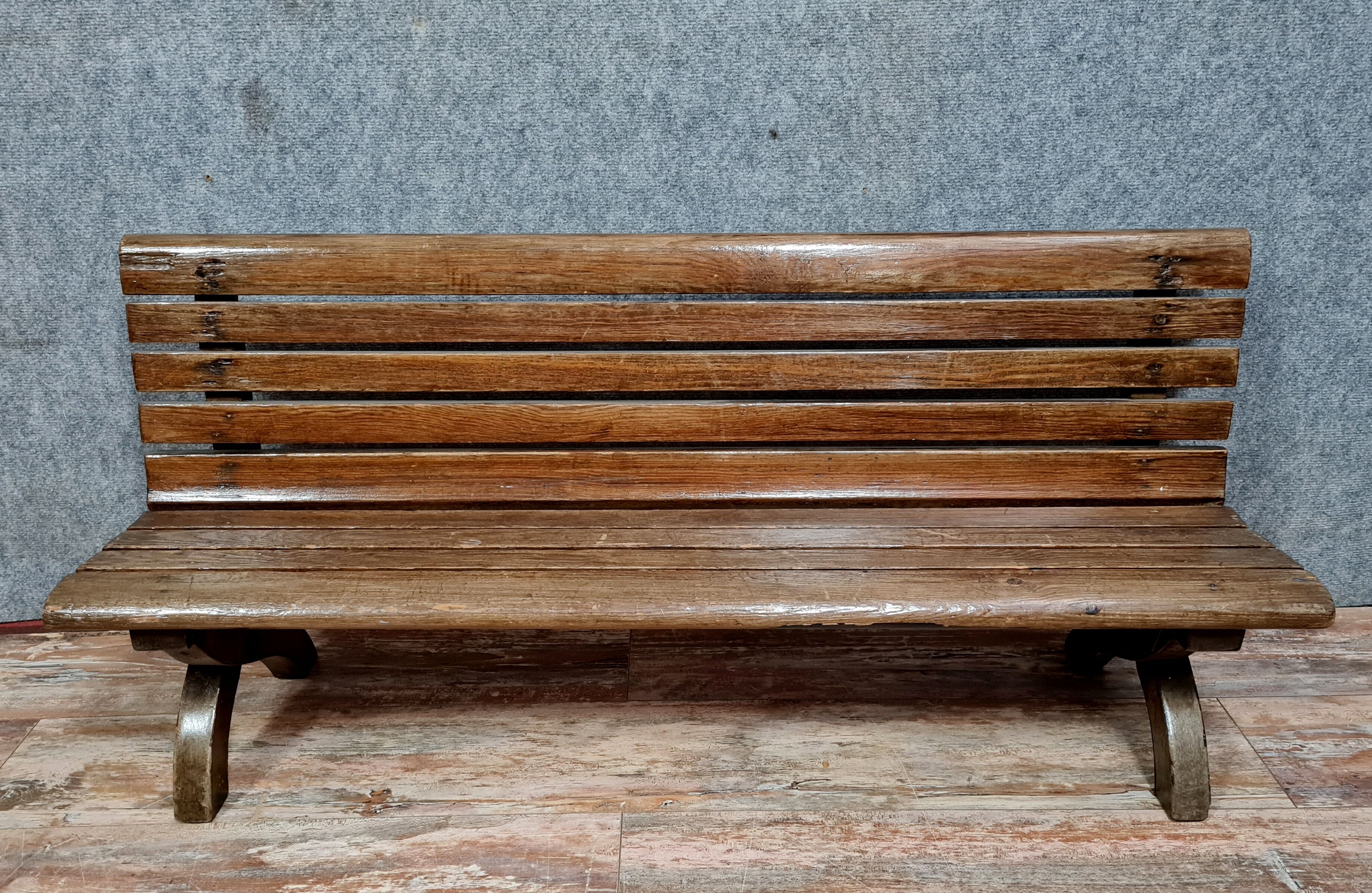 Park bench and garden with natural wood backrest xixth century