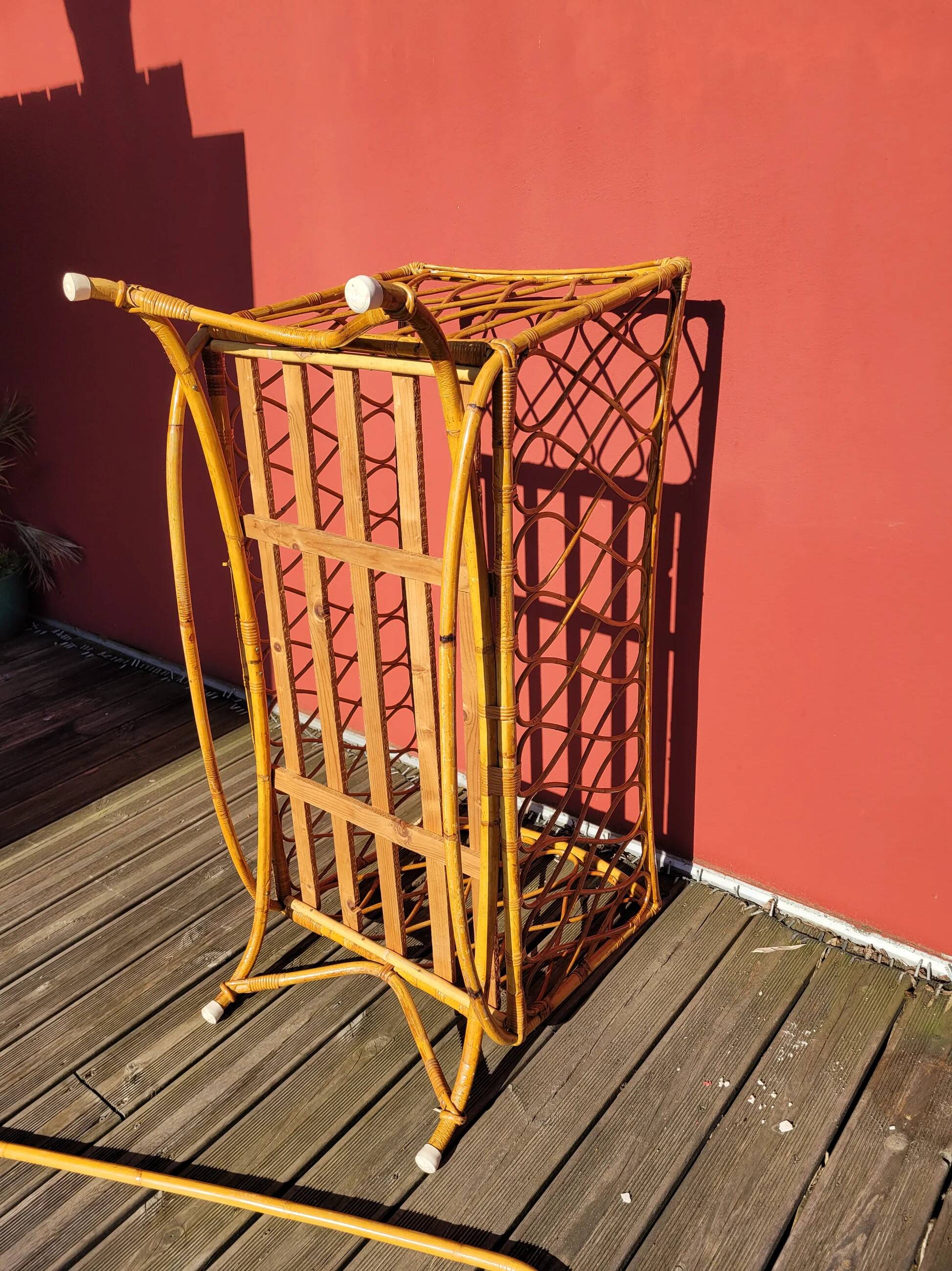 Bamboo and rattan baby cot with canopy.