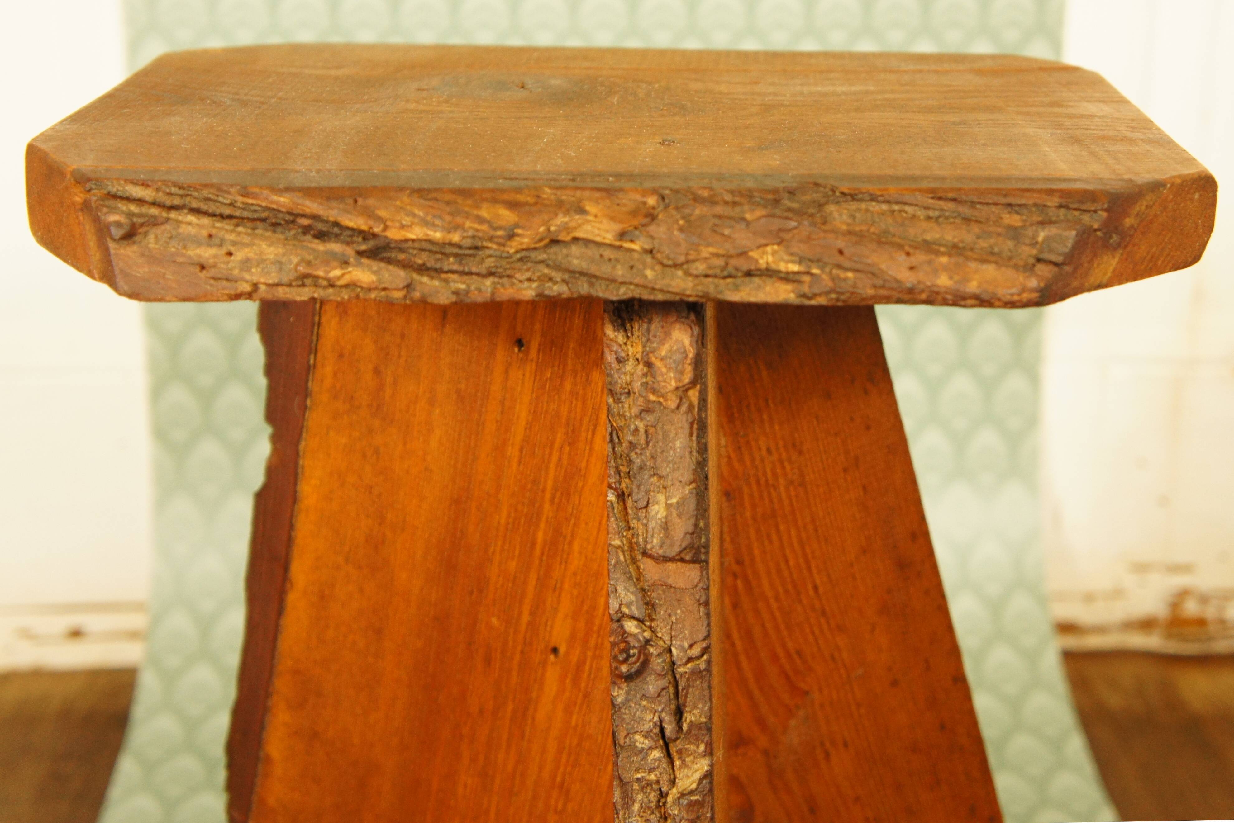 Brutalist stool tripod feet cross