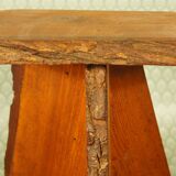 Brutalist stool tripod feet cross