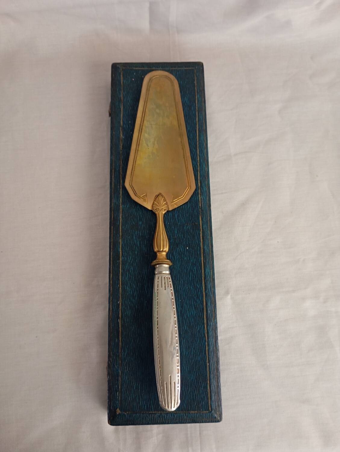 Brass and silver pie server