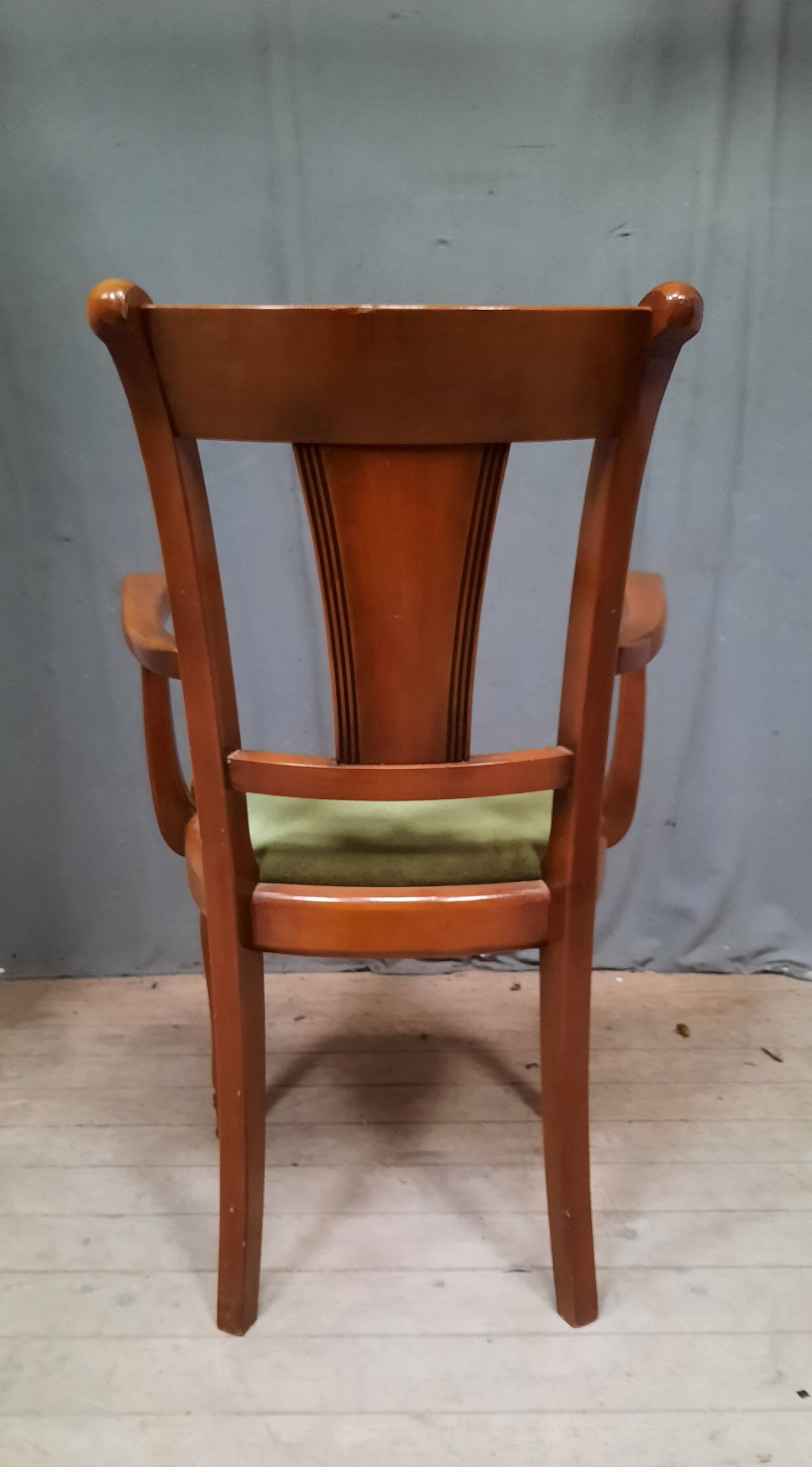 Modern armchair in varnished wood