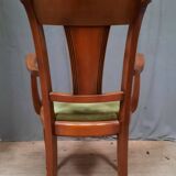 Modern armchair in varnished wood