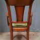 Modern armchair in varnished wood