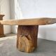 Organic brutalist coffee table in solid cedar, trunk pedestal, 1970s.