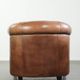 Vintage sheepskin club armchair in English style with deep colours