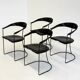 Ensemble de 8 chaises de salle à manger vintage Arrben Ursala en cuir noir.