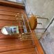 Vintage brown brass dressing table with mirror and matching stool, 1950s - set of 2