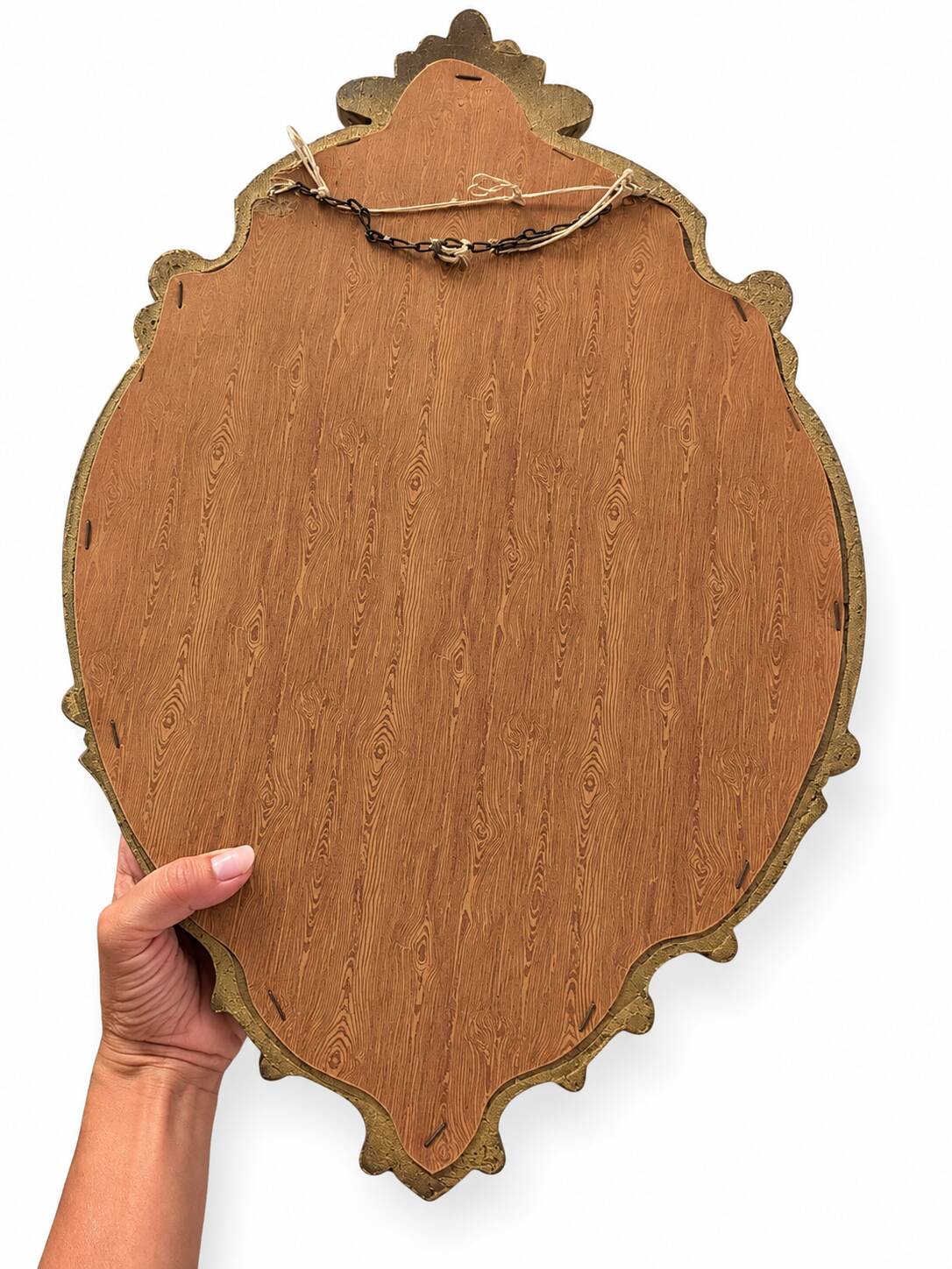 Golden wall mirror in Louis XV style