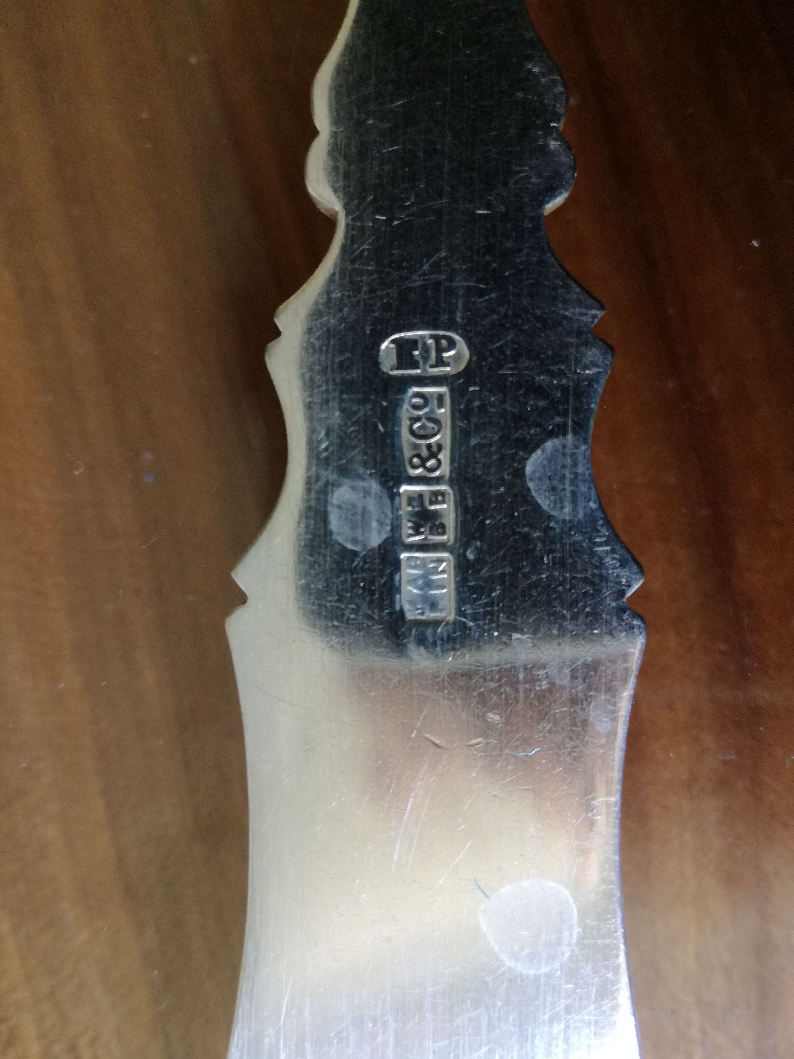 Silver and ivory paper cut