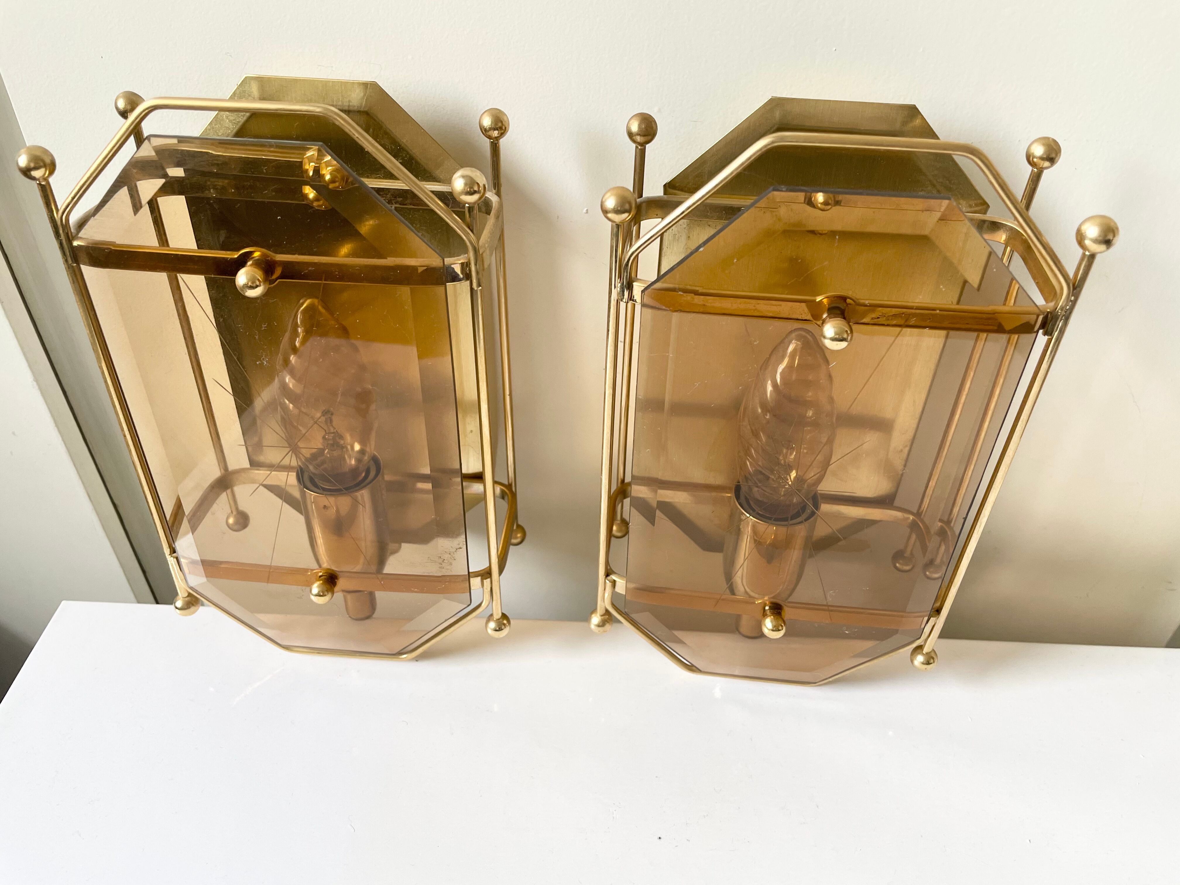 Pair of Scandinavian Vintage  wall light Sconce in Brass & Amber colored Glass