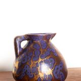 Art Nouveau vase in iridescent purple glazed ceramic by Léon Pointu 1910.