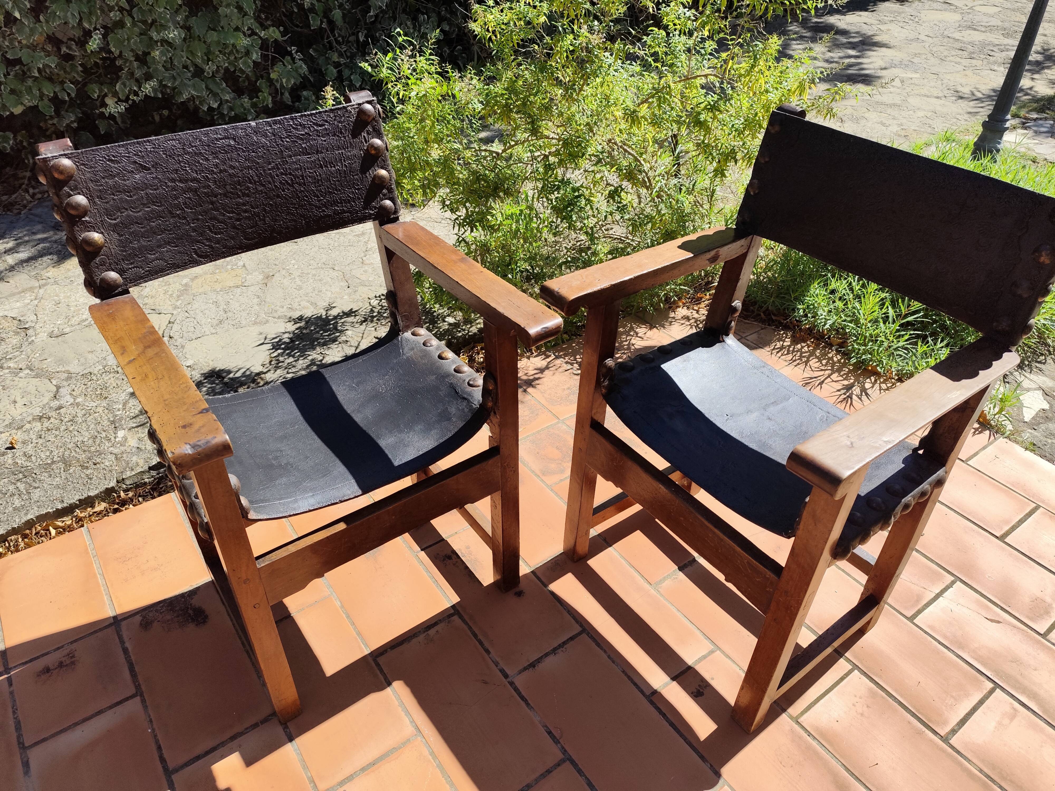 Pair of French Brutalist oak and leather armchairs 1920