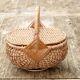 Handcrafted egg basket made of woven rattan and wicker
