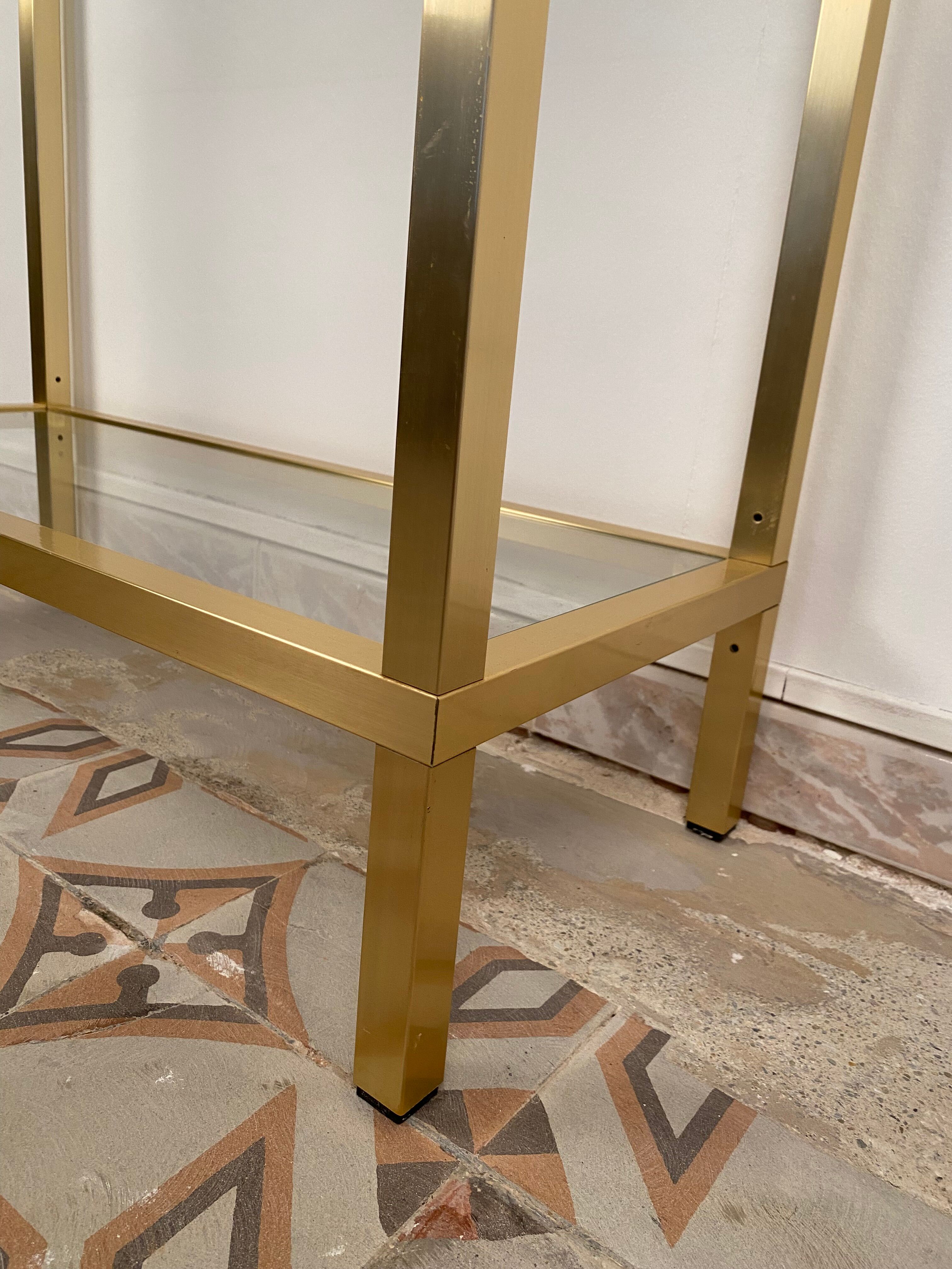 Bookcase in gilded metal and glass, Pierre Vandel Paris, circa 70