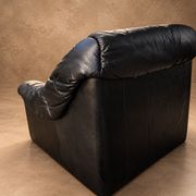 Leather armchairs and matching pouf, Italy, circa 1980